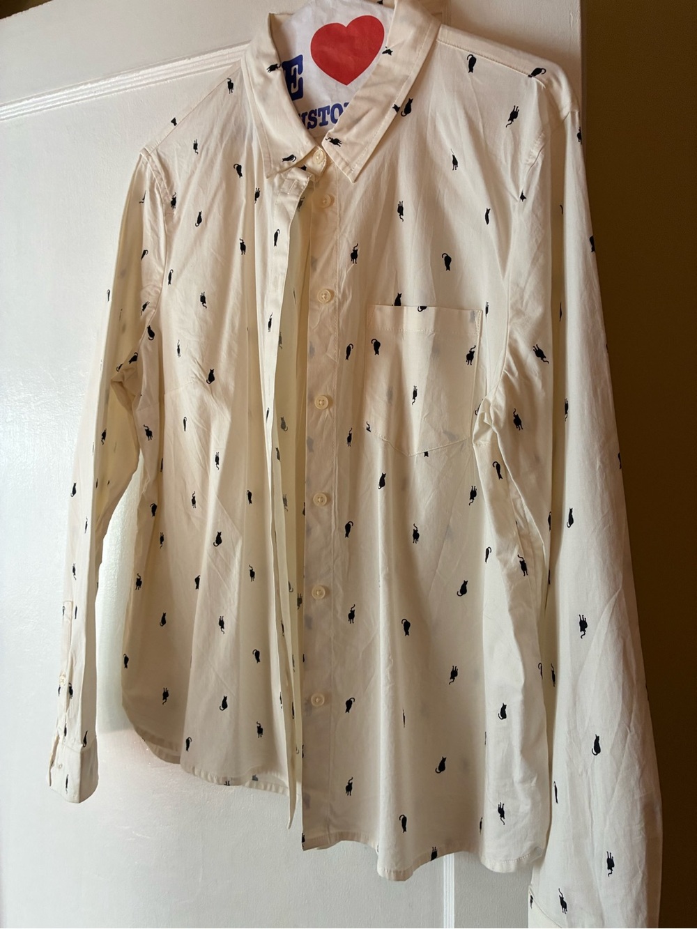Banana Republic cream button up women’s dress shirt with tiny cat print size L